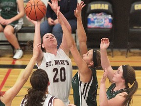 St. Mary’s Knights post Brooke Bellerose (20), along with teammate Stacie Cain (14) will be two of the go-to players when St. Mary’s hits the floor this weekend for the NOSSA AA playdowns at St. Mary’s College.