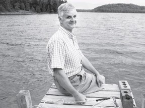 Stephen Butcher, chair of Long Lake Stewardship Committee, is seen here in this file photo taken in July. Butcher says the lake became contaminated when gold mine tailings were disturbed by work crews in the Luke Creek area.