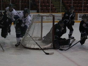 The Melfort Mustangs'  Brandon Sloan attempts a wraparound against the Battlefords North Stars on Wednesday, November 14 at the Northern Lights Palace.