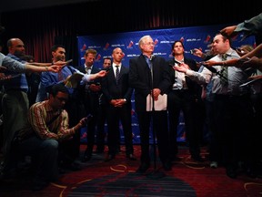 Donald Fehr (C), executive director of the National Hockey League Players Association, speaks at a news conference as players Ron Hainsey (center R) and Manny Malhotra (center L) look on, in New York last month. (REUTERS)