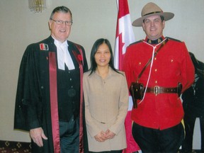Li Xia (Lisa) Zhang (middle) received her Canadian Citizenship on November 7, 2012.