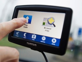 A TomTom navigation device is seen in this photo illustration taken in Amsterdam February 28, 2012. (REUTERS/Robin van Lonkhuysen/United Photos)