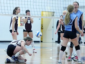 The John Paul II girls' volleyball season came to an end with a loss to Edmonton public school Millwoods Christian, which edged the Patriots three games to two in zone semifinals. Rick Volman/Record Staff
