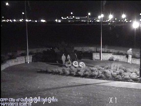 Still images taken from a surveillance camera at the Afghanistan Repatriation Memorial in Trenton, ON., are seen here with the image of a man who vandalized the area surrounding the memorial. (Handout/Quinte West OPP)