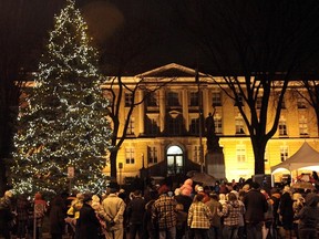 The Downtown Association hosted their Moonlight Magic Lights the Night Downtown on Thursday night. A crowd gather's around court house for the tree lighting ceremony. The event was a kick off for the holiday season for the downtown, for both shops and restaurants.
