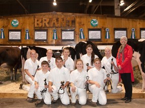Photo by ELLA WRIGHT 

Members of the winning Brant County 4-H team  at the Royal Agricultural Fair are Serena Allardyce (back, left), Nicole Charlton, Collin Allardyce, Jocelyn Sayles, Jennifer Charlton, Brent Sayles (front, left), Colton Oughtred, Valerie Stone and Erica Sayles, with sponsor, Penny Jensen of Jensen Halters.