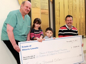 In honour of their great-uncle Ottavio Lionello's memory, Gabriel and Elena were happy to present his $25,000 donation to the Timmins and District Hospital Foundation. From left are Dr. Claude Vezina, director of the TDH Foundation, Elena Lionello, Gabriel Lionello and TDH Foundation vice-chairman Michel Lessard.