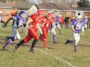 Jackson McClay of the Waterford Wolves runs the ball during his team’s semifinal game against the Valley Heights Bears on Thursday. The Wolves won the match 66-7 and move on to the Haldimand-Norfolk Bowl a week from Saturday. (DANIEL R. PEARCE Simcoe Reformer)