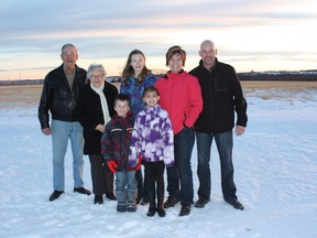 Photo courtesy County of Grande Prairie
The Anderson family was recently received the ATB Financial Farm Family Award  at Northlands annual Farm Family Awards event held in Edmonton during Farm Fair. In the back row, from left to right, are Larry and Vella, Keyana, Kodi and Jason. In the front row are Quintara and Jordan