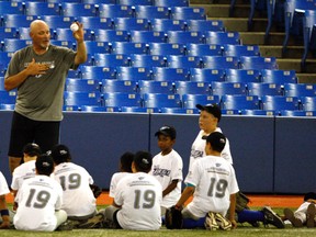 Duane Ward teaches kids at an on-field Instructional Clinic at Rogers Centre in July, 2011. Ward the guest speaker at the Inter County Baseball Association 93rd annual general meeting at Craigowan Golf and Country Club Wednesday night. He said the Blue Jays are investing in communities to help make the Jays Canada's team once again.