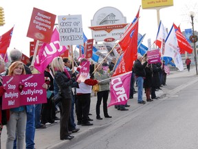 A large contiguent of teachers with the OSSTF and the ETFO were joined by CUPE members in a solidarity rally along Talbot Street  at the entrance of the Canada Southern Railway station where the office of Conservative MPP Jeff Yurek is housed to display their opposition to Bill 115 which has been passed and freezes their wages for two years. Yurek agreed had agreed to come outside and meet with them mid-rally.