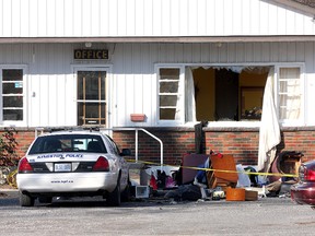 Items are strewn outside a room at the Siesta Motel on Friday after a man had barricaded himself inside the room with a gun on Thursday afternoon. The incident was resolved at 1:30 a.m. on Friday.
Ian MacAlpine The Whig-Standard