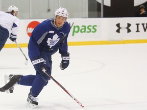 Kingston’s Jay McClement, who signed with the Toronto Maple Leafs this past summer, skates with Leafs and Toronto Marlies players at the Mastercard Centre in Toronto on Sept. 6. During the NHL lockout McClement has spent lots of quality time with family and friends. (QMI Agency)