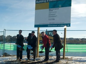 (From left) Airdrie MLA Rob Anderson, Rocky View Schools board of trustees chair Bruce Pettigrew, Airdrie Mayor Peter Brown, and Alberta Justice Minister Jonathan Denis (appearing on behalf of Education Minister Jeff Johnson), turn the sod at the site of the new Airdrie high school, to be opened in September 2014. The sod turning was the third of the day - the group also broke ground on the new Airdrie middle school site and the site of the new K-9 school in Chestermere.
MARIE POLLOCK/AIRDRIE ECHO/QMI AGENCY