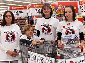 HELP Stand Up 2 Bullying took a stand at the Timmins Walmart recently, holding a penny drive to help support the redistribution of Timmins Police Service Const. Rick Lemieux's series of children's books about the dangers of bullying. The group and Lemieux hope to put an end to bullying in our community for good. From left are Sharon Kalluk, Ryan Cote, Sally Tiberi and Keri Anne Cote.