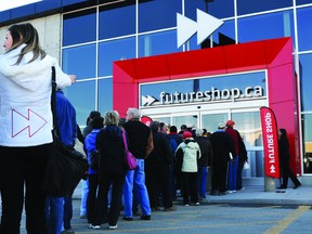 Around 150 people lined up Friday morning to take advantage of the grand opening deals at the new Futureshop.ca outlet on Parkedale Avenue. MEGAN BURKE/The Recorder and Times