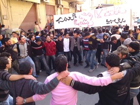 Demonstrators protest against Syria's President Bashar al-Assad after Friday prayers in Yabroud, near Damascus November 16, 2012. The banner reads: "Friday of support Syrian National Coalition" REUTERS/Raed Al-Fares/Shaam News Network/Handout