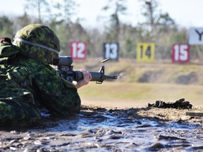 Ryan Paulsen ryan.paulsen@sunmedia.ca Cpl. Cinthia Simard fires a round from her C7 rifle while working on her sights and groupings before her Personal Weapons Test (PWT) at CFB Petawawa, giving assembled civilian DND and local media personnel an example to follow. For more community photos please visit our website photo gallery at www.thedailyobserver.ca.