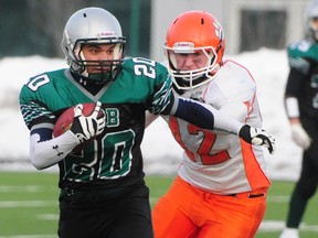 Austin O' Brien Crusaders wide receiver Jeremiah Varghese narrowly escapes a tackle in the Northern Regional Provincial final against the McNally Tigers at Clarke Field in Edmonton, Alberta on Saturday, November 17, 2012. The Crusaders defeated the Tigers 48-0. TREVOR ROBB/EDMONTON EXAMINER