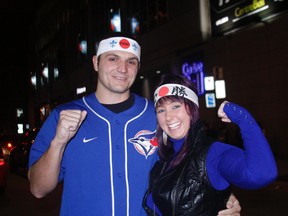 David Clarkson and Nicole Leah travelled from Brampton to Montreal to watch UFC154. They also hope to grab a pair of tickets to watch the Argos and Alouettes play Sunday afternoon in the CFL's East Final. (Joe Warmington/Toronto Sun)