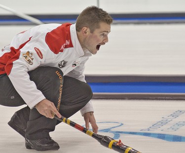 Manitoba skip Mike McEwen calls the sweep during a Masters Grand Slam of Curling match on Friday. (BRIAN THOMPSON/QMI Agency)
