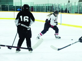 Brooke-Lyn Riley gears up a shot against the Eastman Selects on Saturday at the BDO Centre for the Community.  The Caps tied the Selects 1-1.  (Jordan Maxwell/Portage Daily Graphic/QMI Agency)