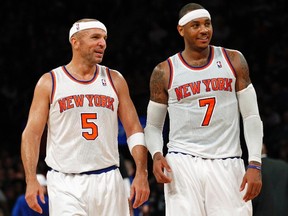 New York Knicks point guard Jason Kidd (L) and forward Carmelo Anthony walk back on to the court after a time out against the Indiana Pacers in the third quarter of their NBA basketball game at Madison Square Garden in New York, November 18, 2012.  REUTERS/Adam Hunger