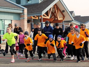 Runners set off in front of École catholique  Anicet Morin on Sunday morning, staching and dashing their way towards the eventual eradication of prostate cancer. Although the funds raised from the run won’t be tallied until the end of the month, organizers are confident the money raised will make a difference.