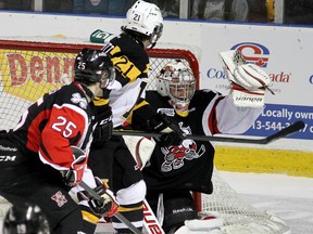 Kingston Frontenacs' Sam Schutt looks for the puck in front of Niagara IceDogs goalie Christopher Festarini during Ontario Hockey League action at the K-Rock Centre on Sunday. The Fronts won 5-4 in overtime. (Ian MacAlpine/The Whig-Standard)