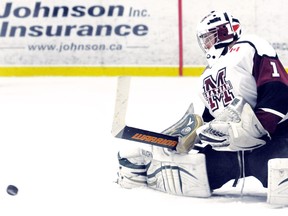 Chatham Maroons goalie Darien Ekblad makes a save during a 5-2 win over the Leamington Flyers on Sunday at Memorial Arena. (MARK MALONE/The Daily News)