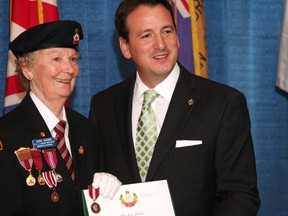 Alice Jardine, a community volunteer for more than 40 years, is presented a Diamond Jubilee Medal from Kenora MP Greg Rickford at a ceremony honouring eight local volunteers Friday.
GARETT WILLIAMS/Daily Miner and News