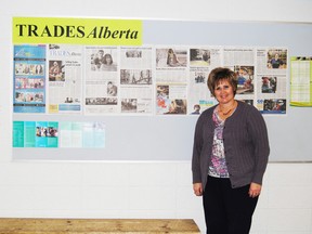 Kathy Kemp, Registered Apprenticeship coordinator and counsellor at the Mayerthorpe High School, poses underneath the Trades Alberta Board. Four students from Mayerthorpe High School received $1,000 scholarships to go towards furthering their education in the trades.
Barry Kerton | Mayerthorpe Freelancer