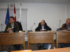 Mayor Craig Copeland, left, explains the water situation while Couns.Kelvin Plain (centre) and Duane Lay listen, during a Nov. 16 press conference.