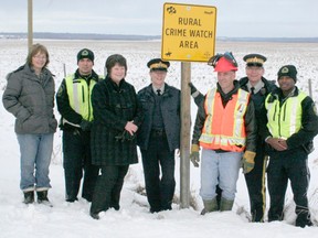 Last Tuesday members and supporters of the Tomahawk Rural Crime Watch Association were on hand to see one of the associations new road signs be put along the side of Township Road 510. The sign is one of 16 that will be installed throughout the association’s membership area.