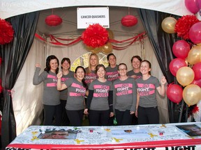 The Cancer Quashers pose at the Light the Night event in Edmonton in September.