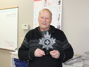 Ron Allen holds his Safety Professional of the Year 2012 award.
Johnna Ruocco | Whitecourt Star
