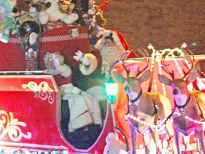 Santa Claus made his appearance, even though there was one man in the crowd Saturday telling kids he didn't exist.