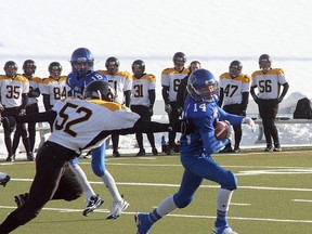 Bison Eric Evans avoids the rush for a big gain during Ardrossan’s 49-32 victory over the Cold Lake Royals during the Tier IV provincial semifinal on Saturday at Foote Field in Edmonton. The Herd play Drumheller in the provincial final this weekend.Photo by Shane Jones/Sherwood Park News/QMI Agency