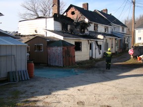 One person is dead and several families are dealing with water and smoke damage to their homes after 91 St. Therese St. caught fire in Temiscaming, Que., Friday night. (Photo by Rene Raymond)