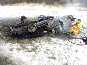 Supplied photo
The grizzly aftermath of a fiery rollover on Highway 63 Saturday near Newbrook. A Ford F350 was completely destroyed, killing the passenger and prompting Wood Buffalo RCMP to remind motorists about the importance of wearing your seatbelt. SUPPLIED PHOTO