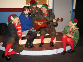 A quartet of elves entertain Susan Barnes — played by Katie Edwards — in the Upper Canada Playhouse's production of Everything I Love About Christmas, which opens in Morrisburg this coming weekend.
Cheryl Brink staff photo
