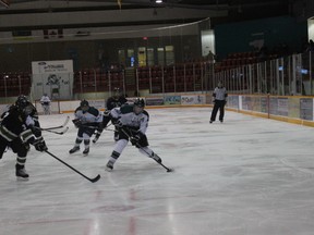 A member of the North East Wolfpack breaks into the offensive zone during the Wolfpack's5-2 victory on Saturday, November 17.