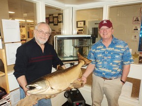 Pictured (left to right) Bob Greason and Al Wilkins, members of the Lake Huron Fishing Club, who have dedicated their time to running a hatchery here at Northport School in Port Elgin.