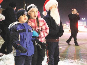 Children line Main Street hoping to catch a glimpse of Santa during the Wetaskiwin Firefighters Santa Parade in Wetaskiwin on Nov. 16, 2012. SARAH O. SWENSON/WETASKIWIN TIMES/QMI AGENCY