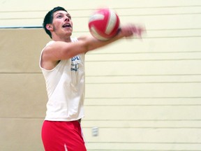 St. Thomas Aquinas senior Noah Gilfix bumps a ball in the final practice before the Saints travel to the provincial championship tournament in Belleville Monday.
GARETT WILLIAMS/Daily Miner and News