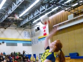 FHS Cobras’ Marcy Osowetski returns a serve during the Cobras first game of the Zones tournament, playing the St. Andrews Saints. (Chris Eakin/Fairview Post)