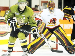 Brampton Battalion forward Barclay Goodrow backs into Belleville Bulls goalie Malcolm Subban during a recent OHL game at Yardmen Arena. Next season, the Battalion will call North Bay home. (OHL Images)