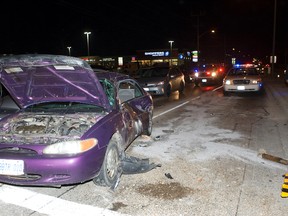 A man is in custody facing charges of impaired driving and leaving the scene of an accident following a collision at the intersection of Commissioners Road and Wellington Road in London, Ontario on Tuesday, November 20. A witness said a car fled the scene after slamming into the pictured car. Police credited citizens that followed the suspect car with helping catch the driver. The male driver of the pictured car was taken to hospital with non life threatening injuries. (DEREK RUTTAN, The London Free Press)