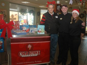 Christmas Care co-ordinator Al Mintz, Tim Hortons/Cold Stone Creamery manager Jason Tanner and team leader Jami Patriqui at the east-end Talbot St. location. Cold Stone Creamery is supporting Christmas Care by donating a portion of sales on Dec. 9 from 1 p.m. to 4 p.m. Staff are also accepting food and toy donations at 995 Talbot St., the store's location.
