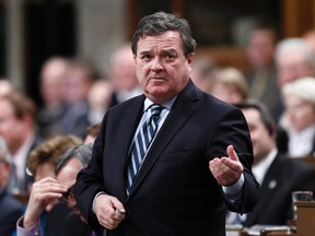 Canada's Finance Minister Jim Flaherty speaks during Question Period in the House of Commons on Parliament Hill in Ottawa November 20, 2012. (Reuters/CHRIS WATTIE)